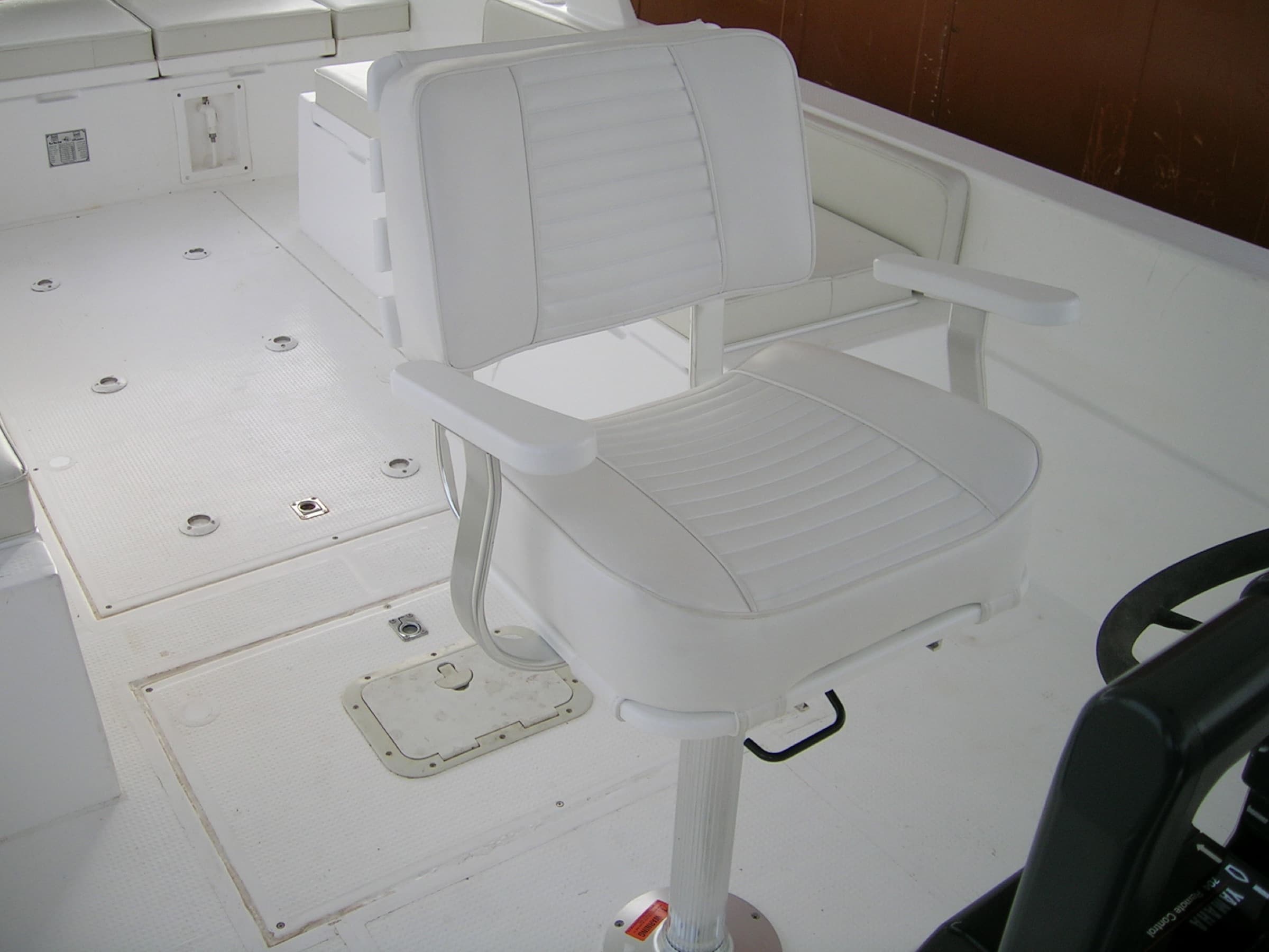 The helm seat of the 12 metre boat on the open deck.